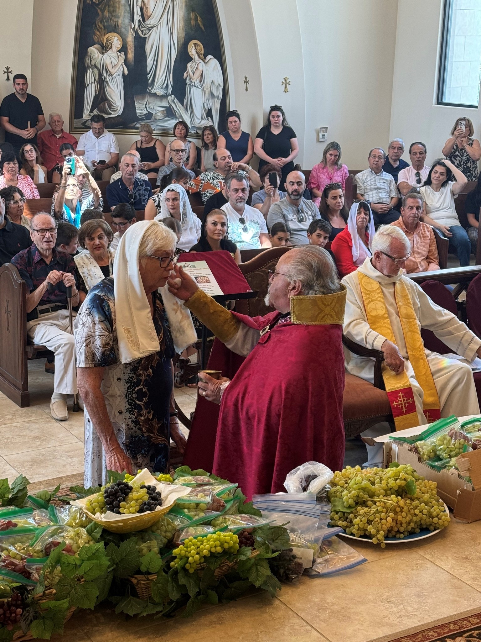 Assumption Celebrated with Conversion and Grape Blessing